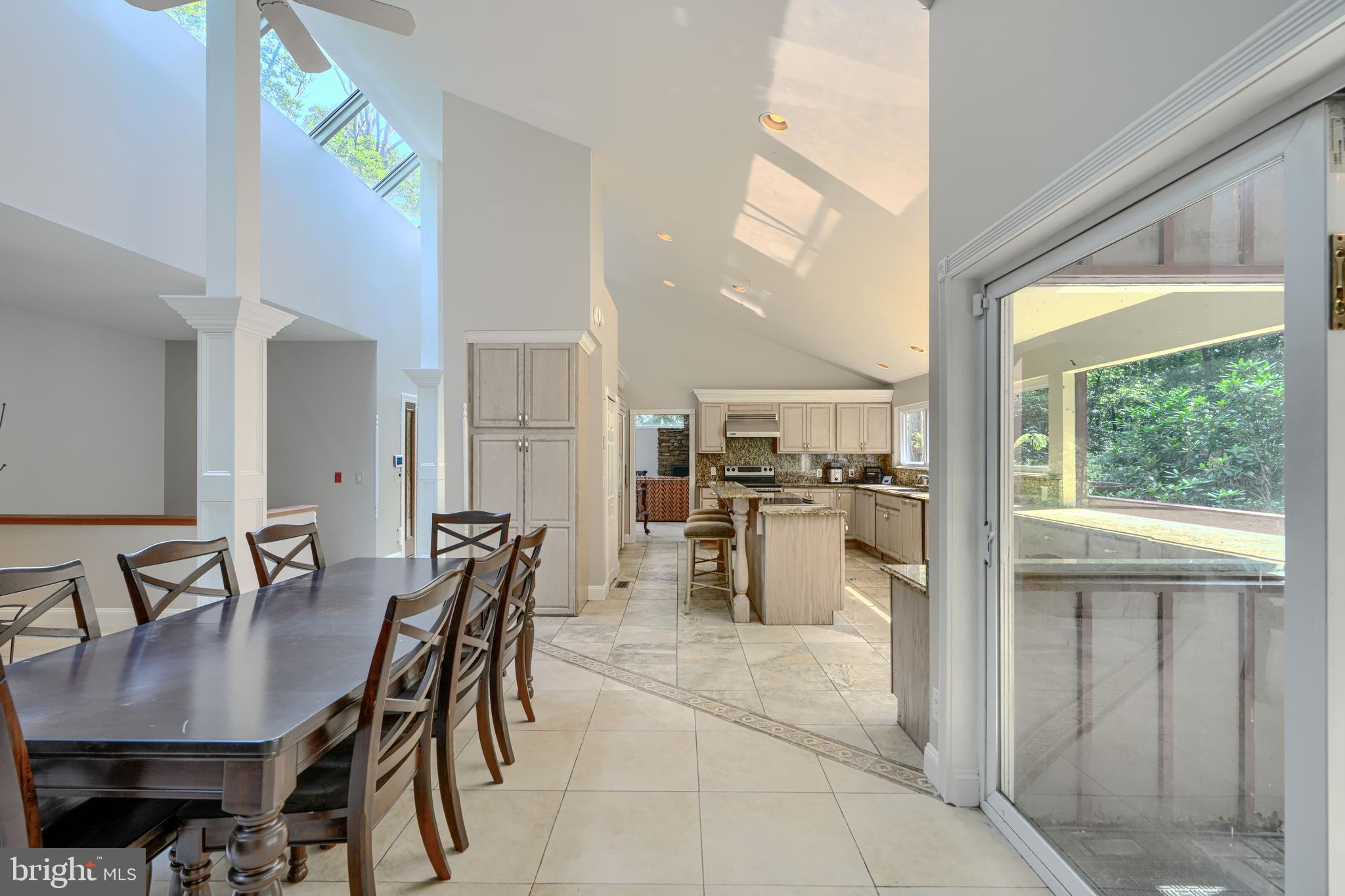 2101 Tufton Avenue Reisterstown, MD 21136 - Photo 19 of 125 a view of a dining room with furniture and a potted plant