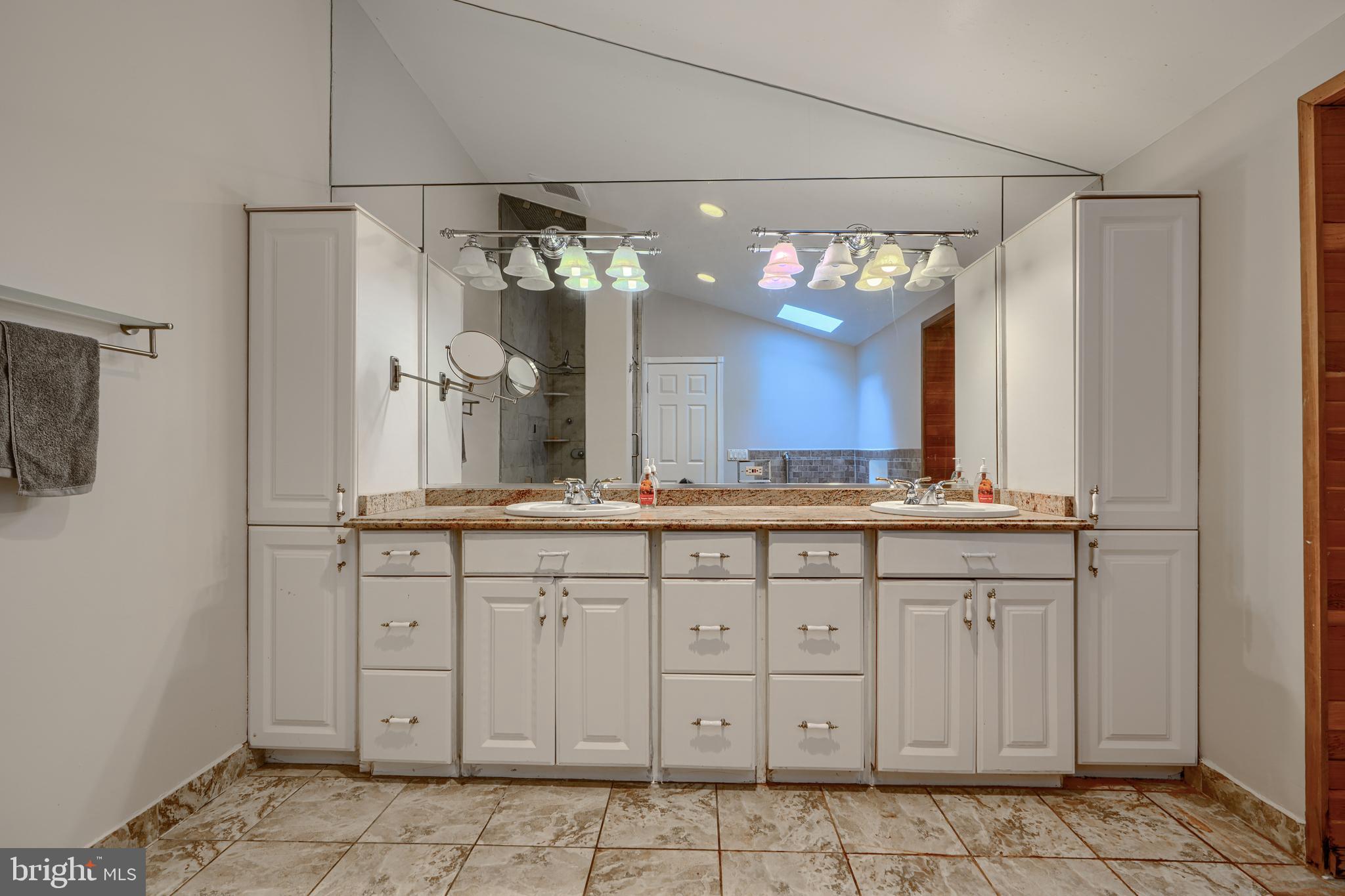 2101 Tufton Avenue Reisterstown, MD 21136 - Photo 38 of 125 a bathroom with a sink vanity and a mirror