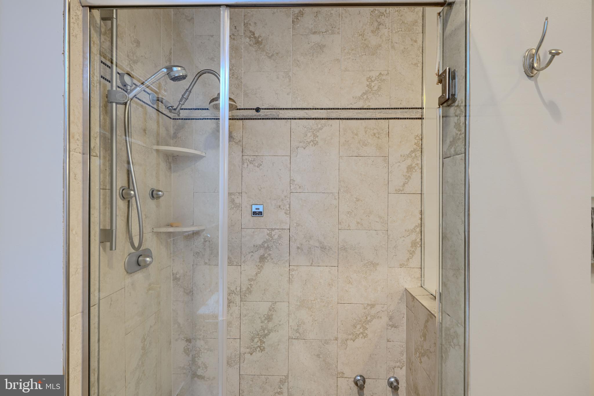 2101 Tufton Avenue Reisterstown, MD 21136 - Photo 39 of 125 a bathroom with a glass shower door