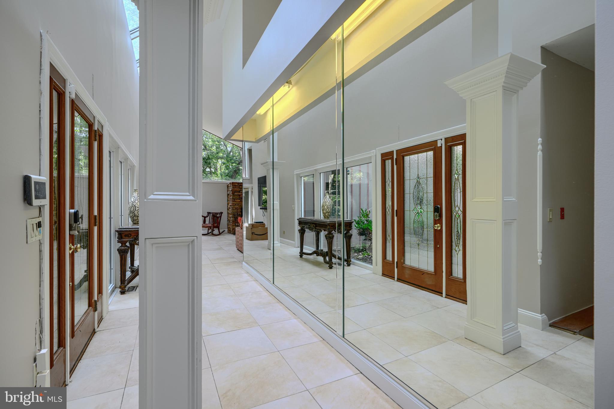 2101 Tufton Avenue Reisterstown, MD 21136 - Photo 4 of 125 a view of a hallway with living room and furniture