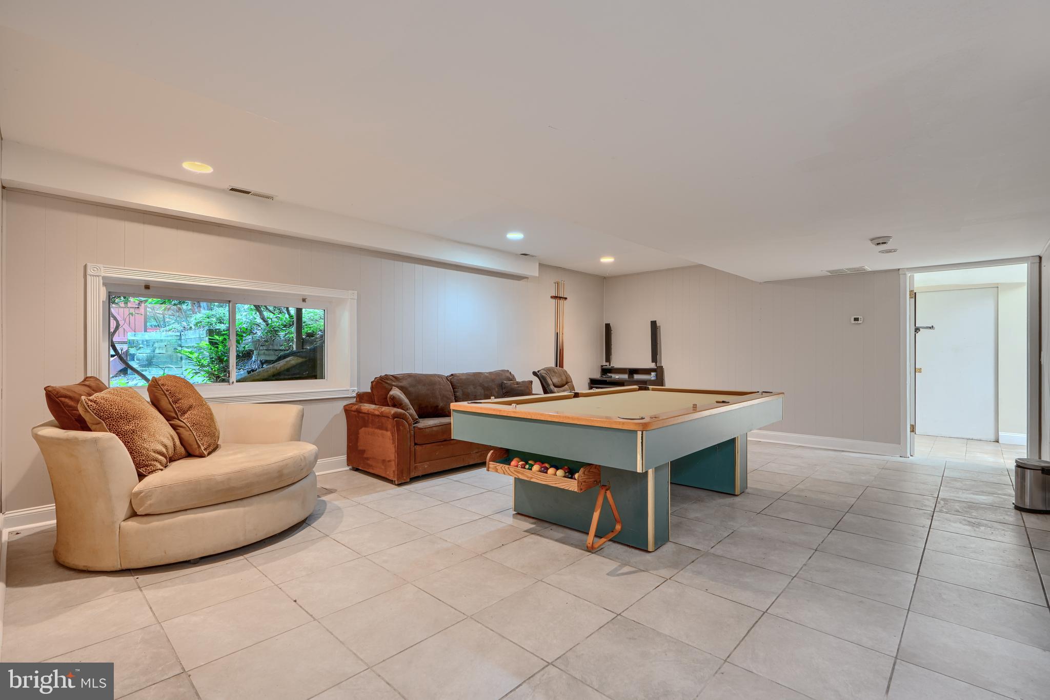 2101 Tufton Avenue Reisterstown, MD 21136 - Photo 52 of 125 a living room with a couch and a large window