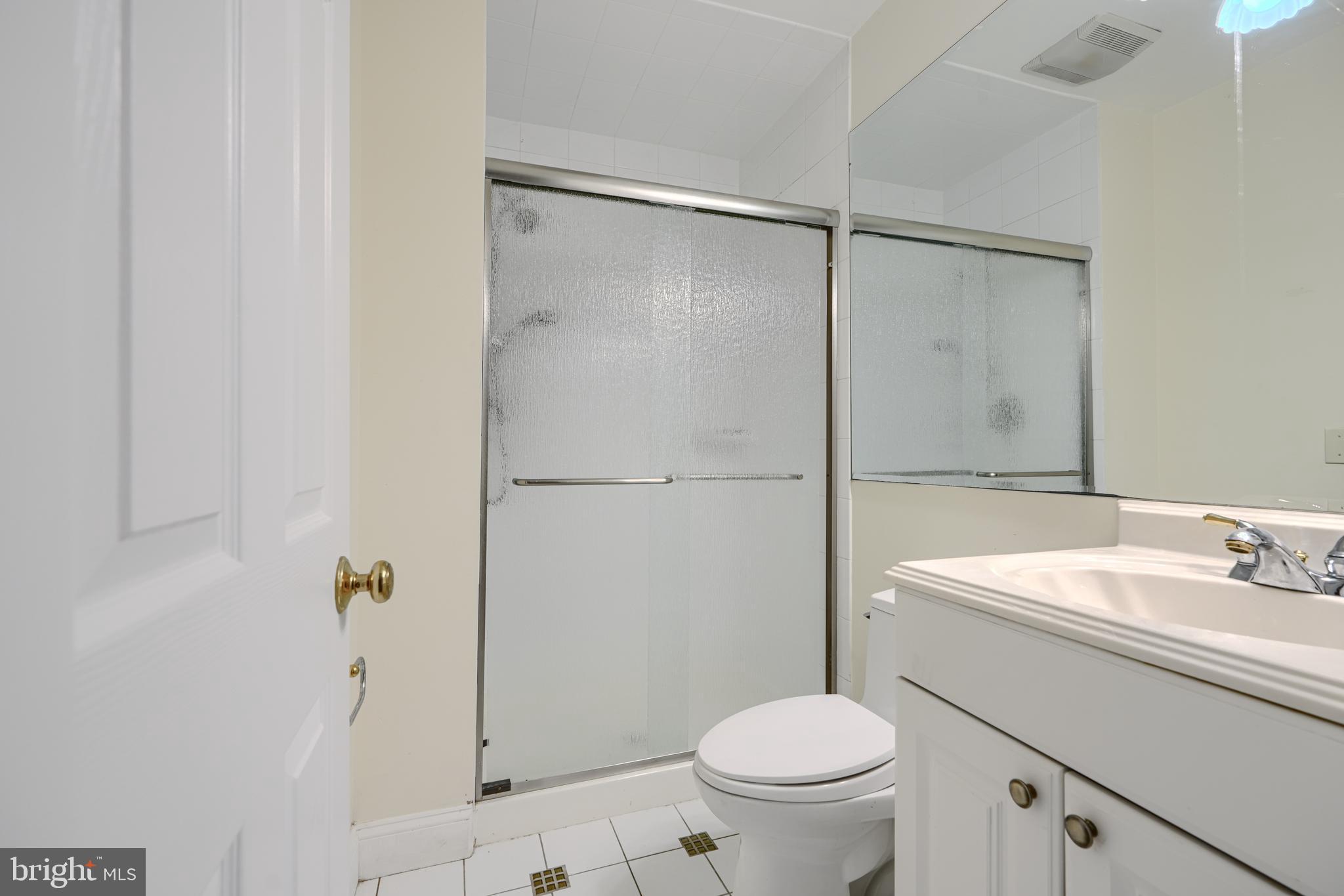2101 Tufton Avenue Reisterstown, MD 21136 - Photo 67 of 125 a bathroom with a sink toilet and shower