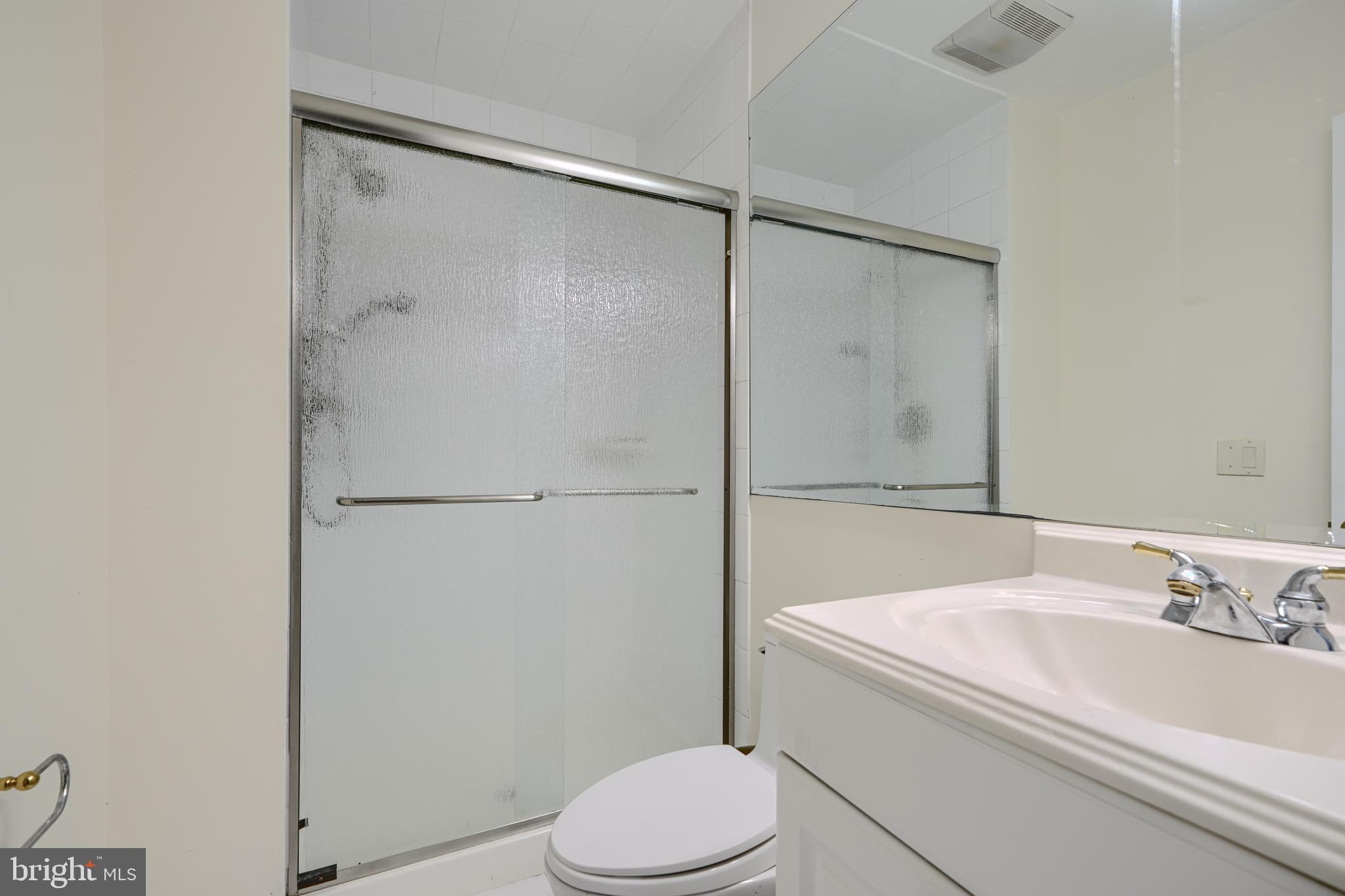 2101 Tufton Avenue Reisterstown, MD 21136 - Photo 68 of 125 a bathroom with a sink toilet and shower