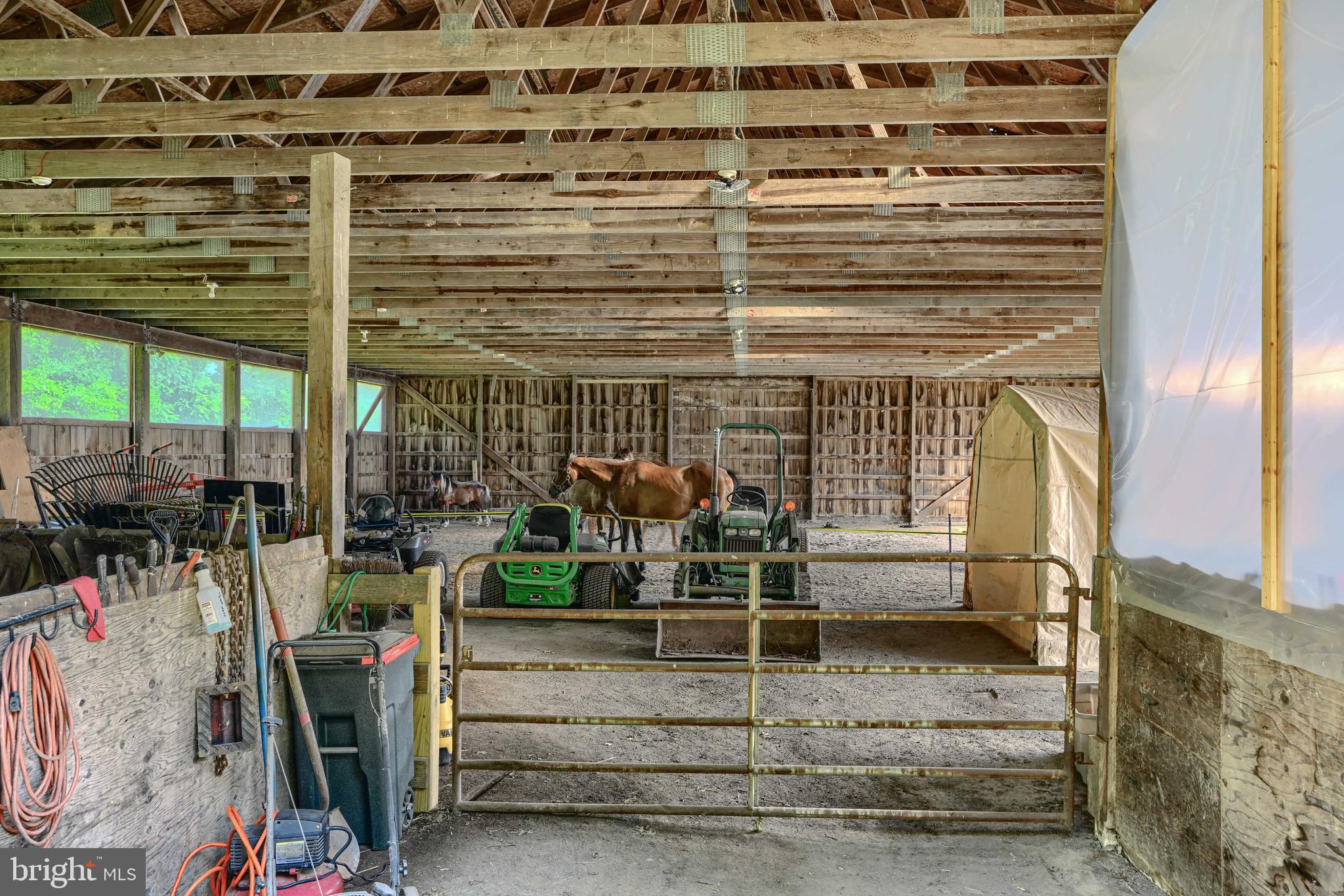 2101 Tufton Avenue Reisterstown, MD 21136 - Photo 100 of 125 a view of a porch with a table and chairs