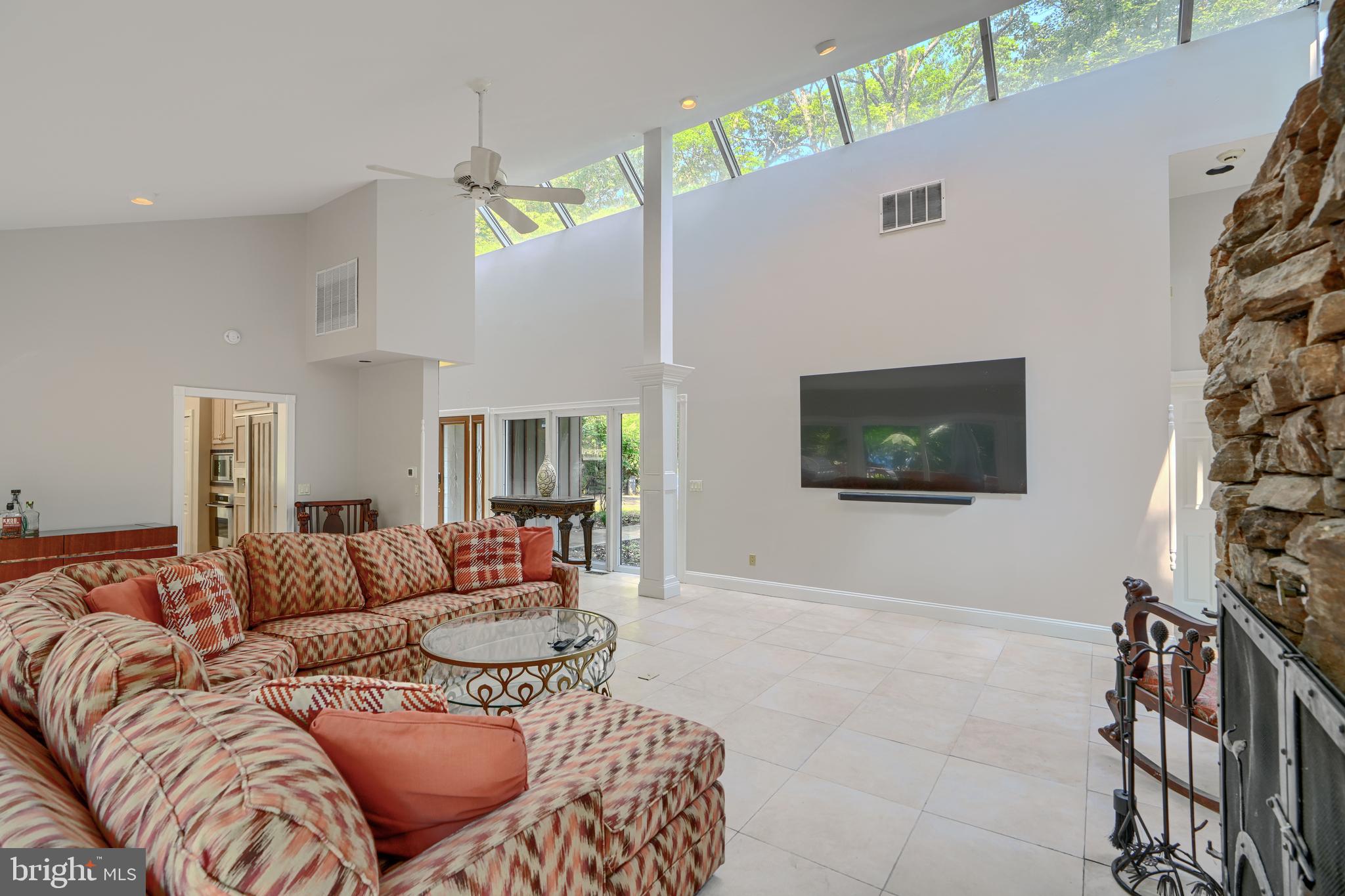 2101 Tufton Avenue Reisterstown, MD 21136 - Photo 10 of 125 a living room with furniture and a flat screen tv