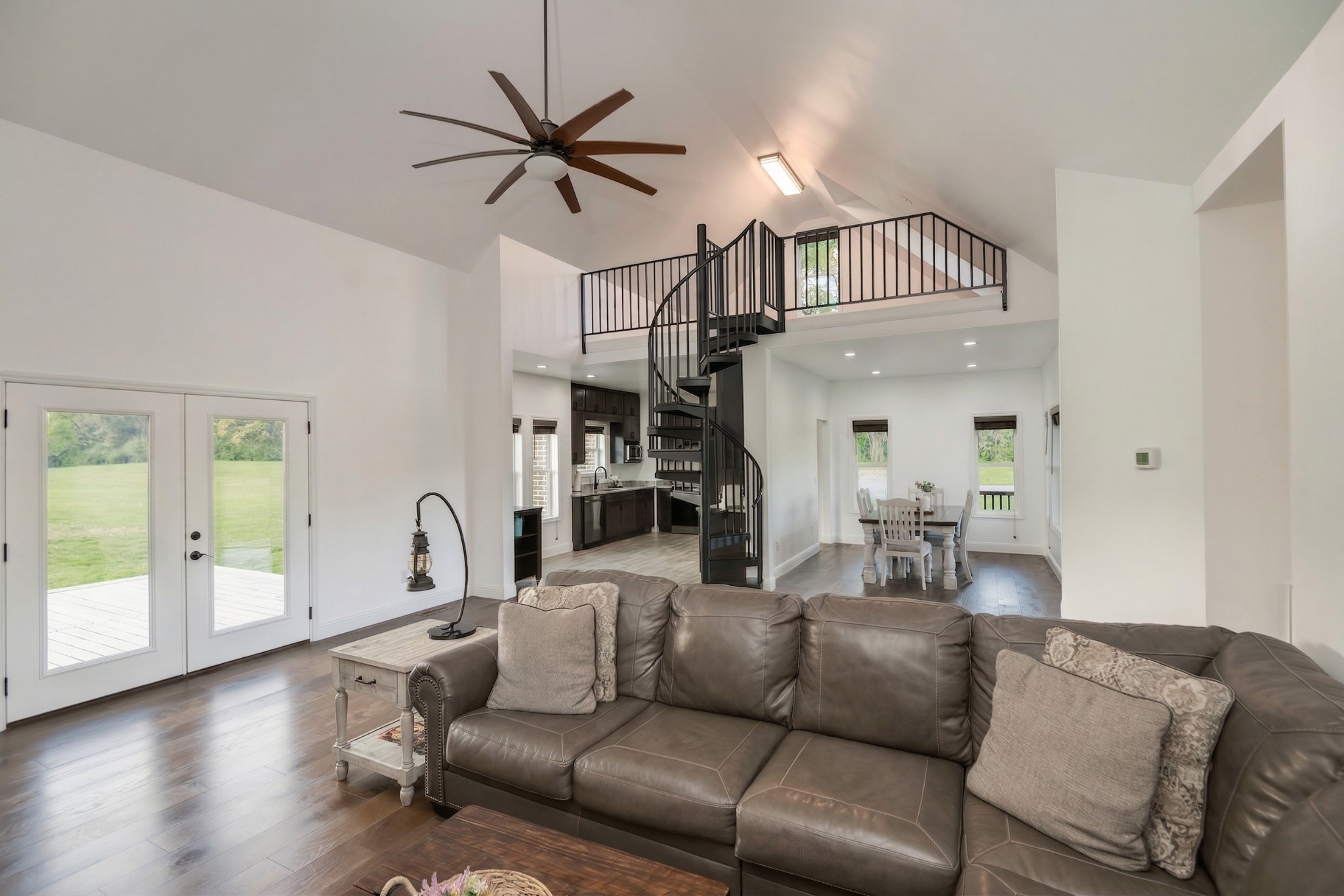 28 Henderson Road Lynchburg, TN 37352 - Photo 32 of 87 a living room with furniture a ceiling fan and a window