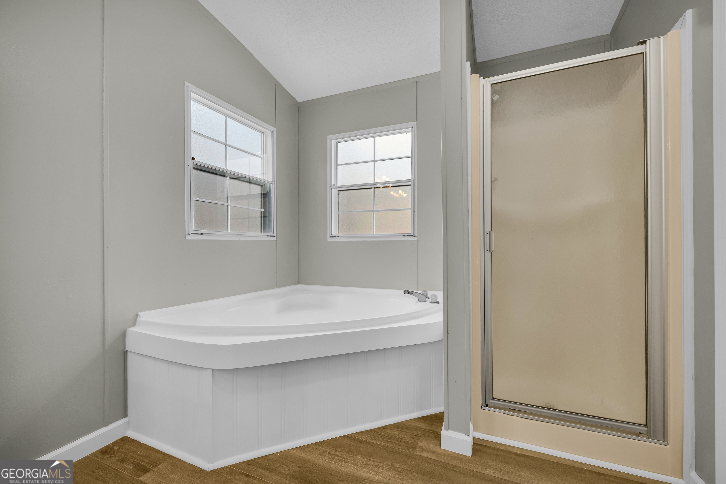 60 Tribble Bottoms Road Arnoldsville, GA 30619 - Photo 40 of 66 a bathroom with a sink and a window
