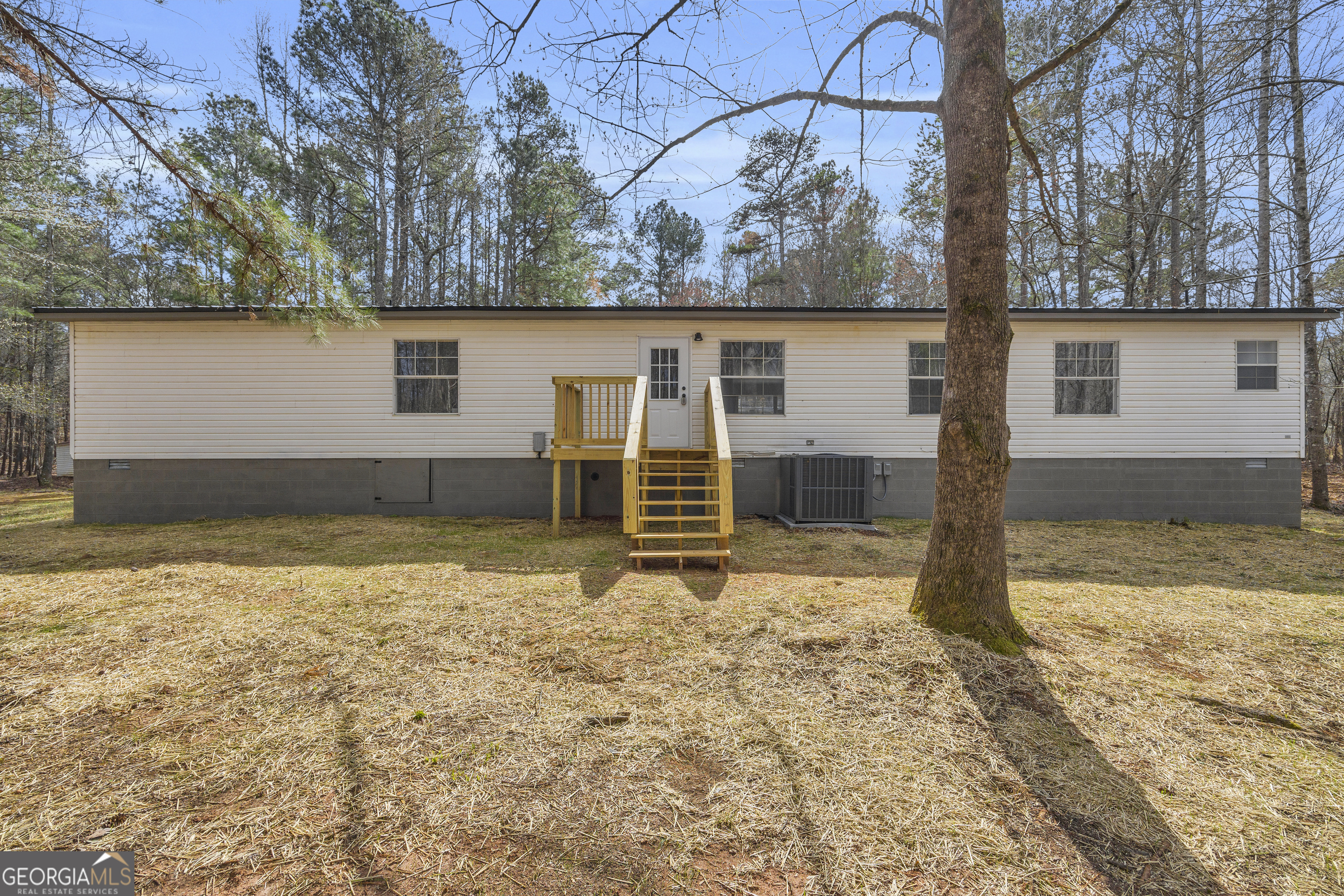 60 Tribble Bottoms Road Arnoldsville, GA 30619 - Photo 46 of 66 a backyard of a house