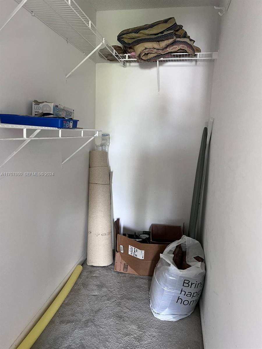 324 Fanshaw H, Unit 324H Boca Raton, FL 33434 - Photo 10 of 13 a view of water heater room