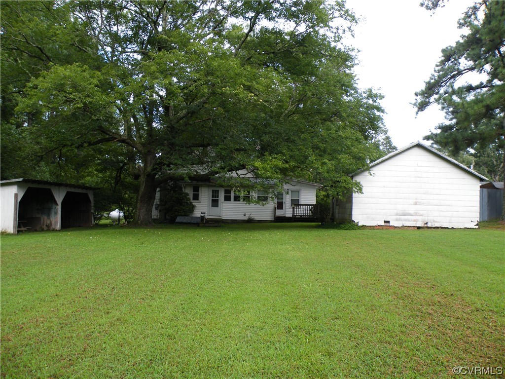 9120 Purdy Road Jarratt, VA 23867 - Photo 8 of 26 Back yard view of the house.