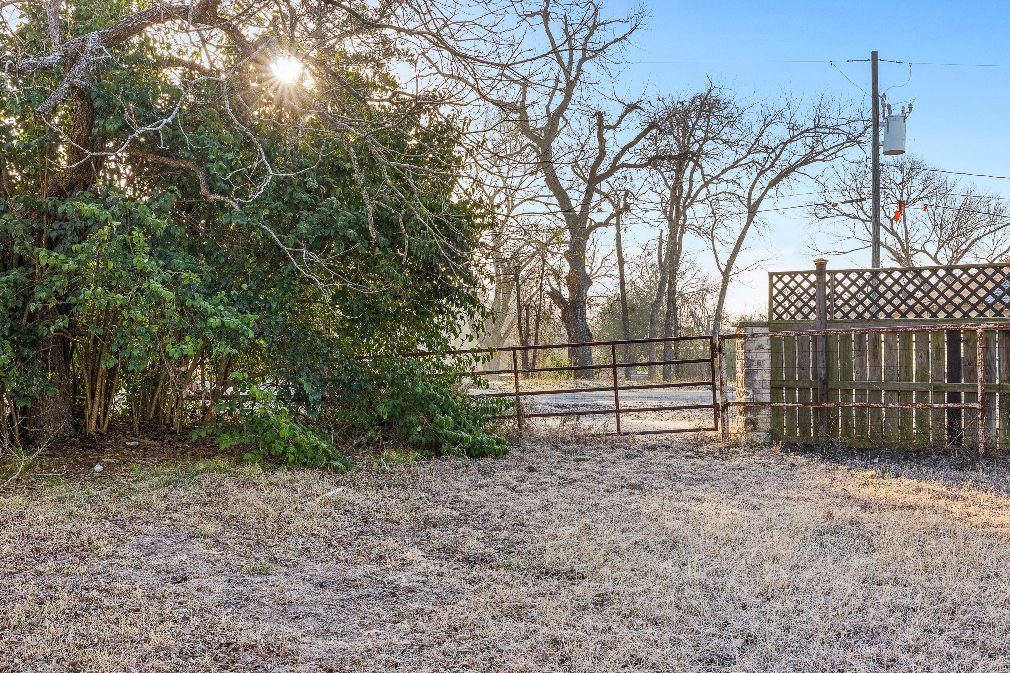 217 West W Hill Navasota, TX 77868 - Photo 11 of 21 a view of backyard with wooden fence