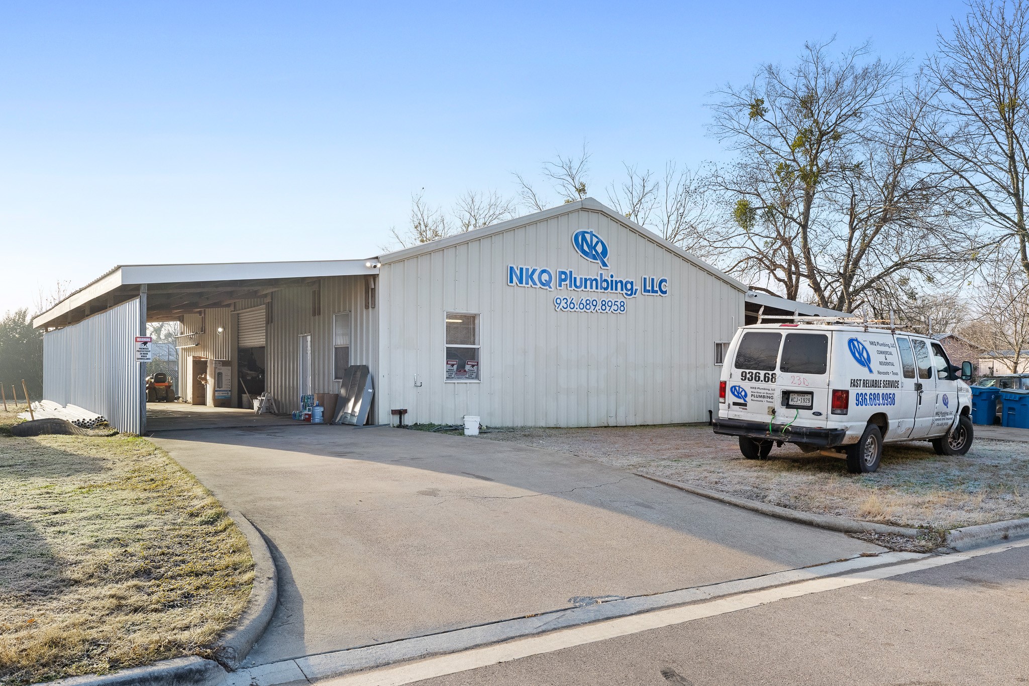 217 West W Hill Navasota, TX 77868 - Photo 2 of 21 a front view of a house with a yard