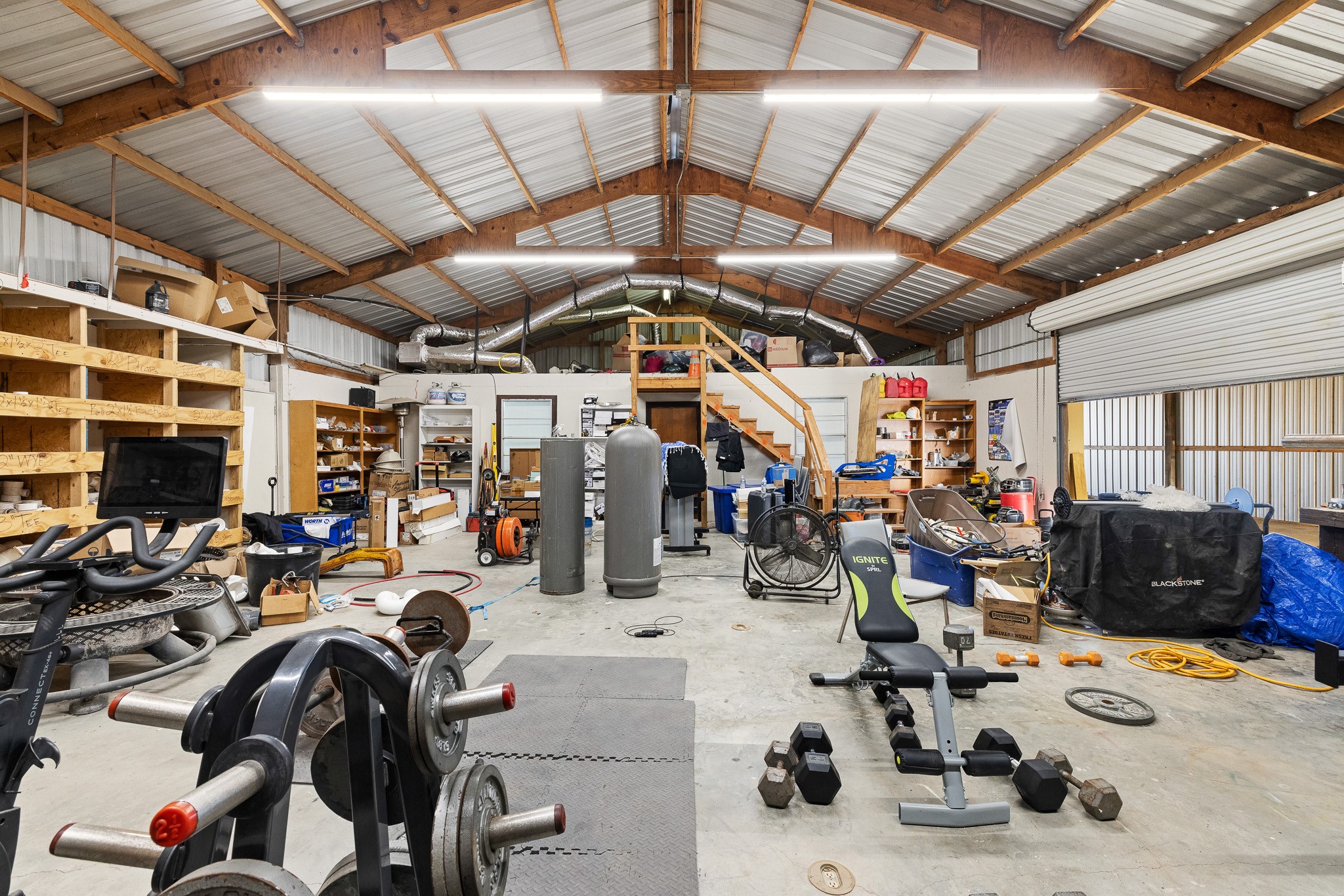 217 West W Hill Navasota, TX 77868 - Photo 7 of 21 a view of a room with gym equipment