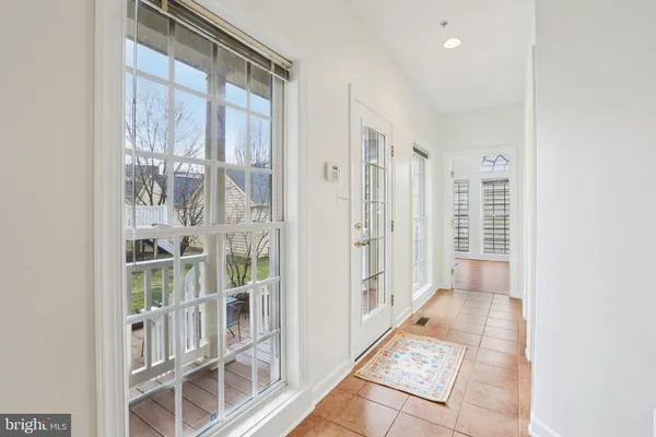 a view of entryway with wooden floor
