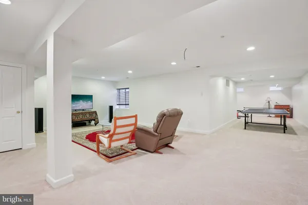 a room with furniture and a flat screen tv