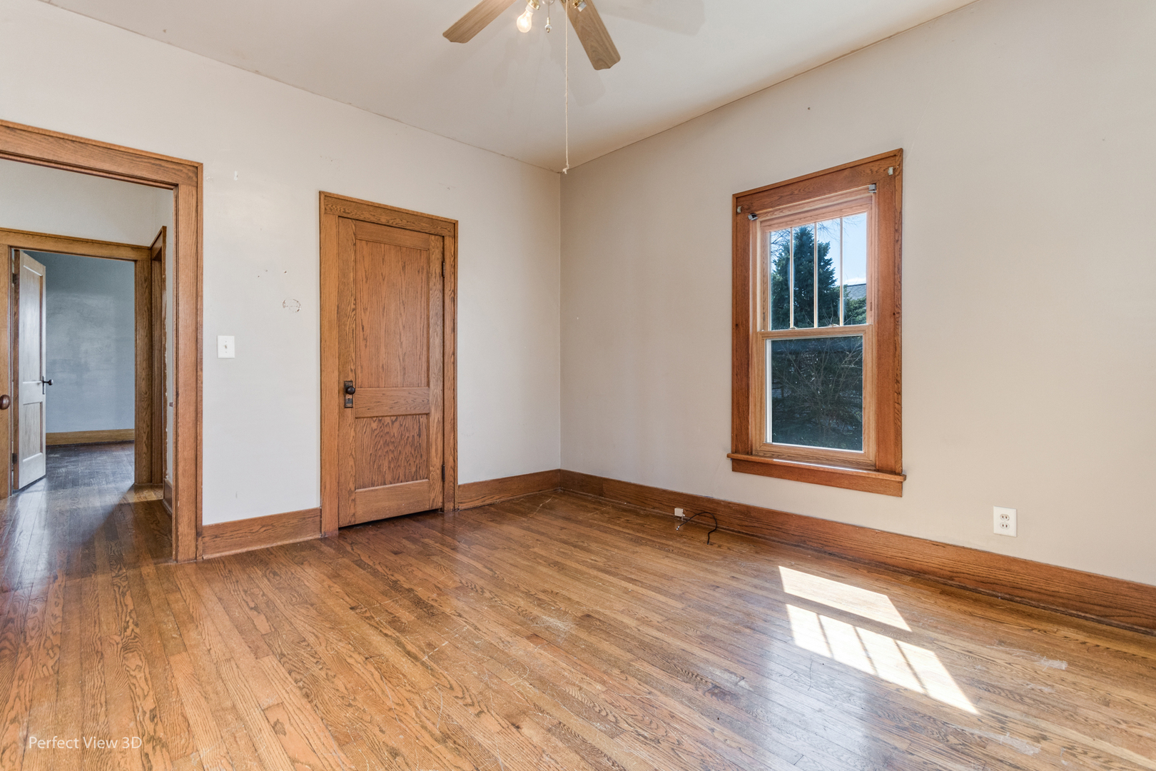 301 South Lincoln Street Ransom, IL 60470 - Photo 13 of 27 a view of an empty room with wooden floor and a window