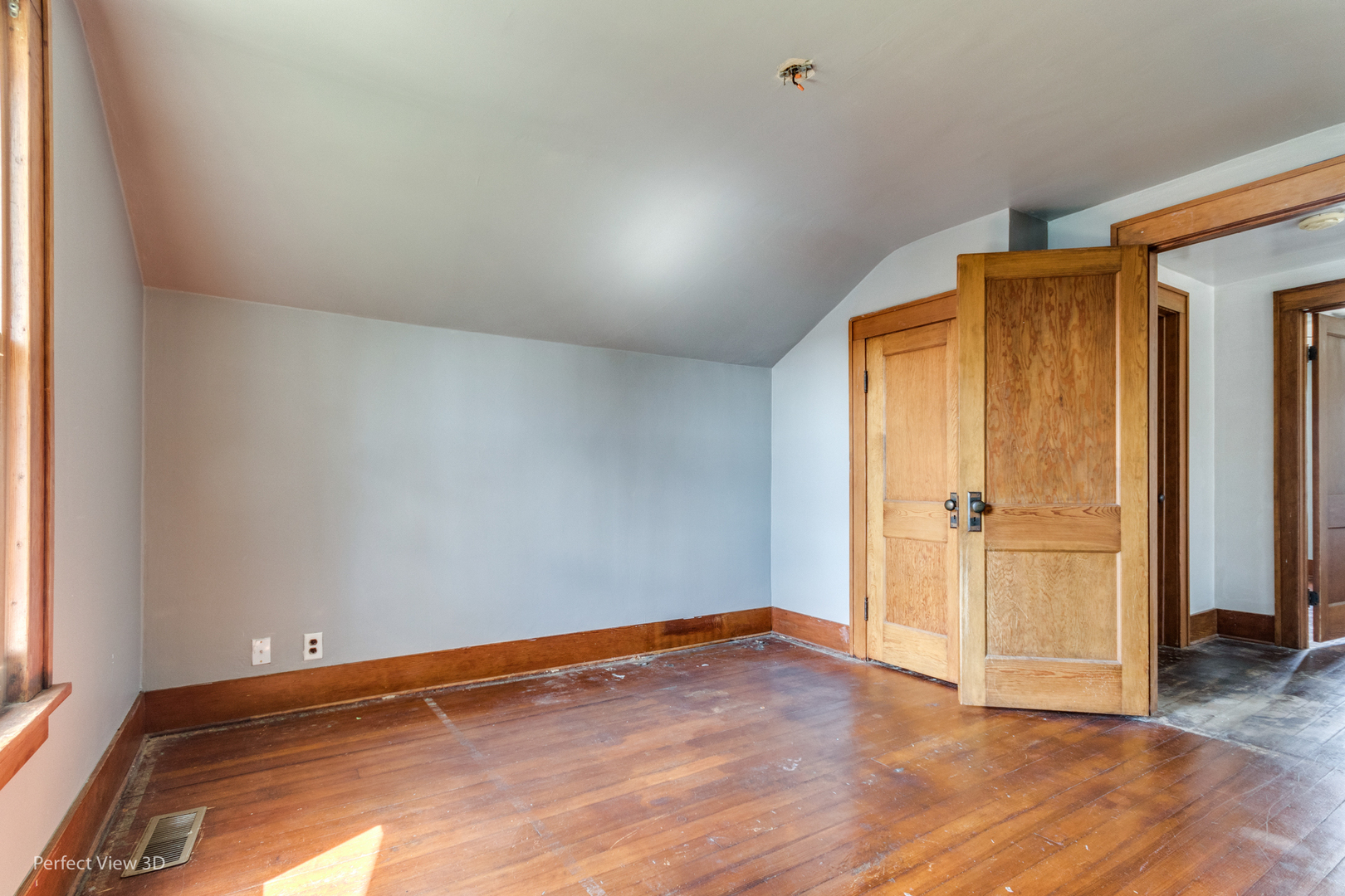 301 South Lincoln Street Ransom, IL 60470 - Photo 17 of 27 an empty room with wooden floor and windows