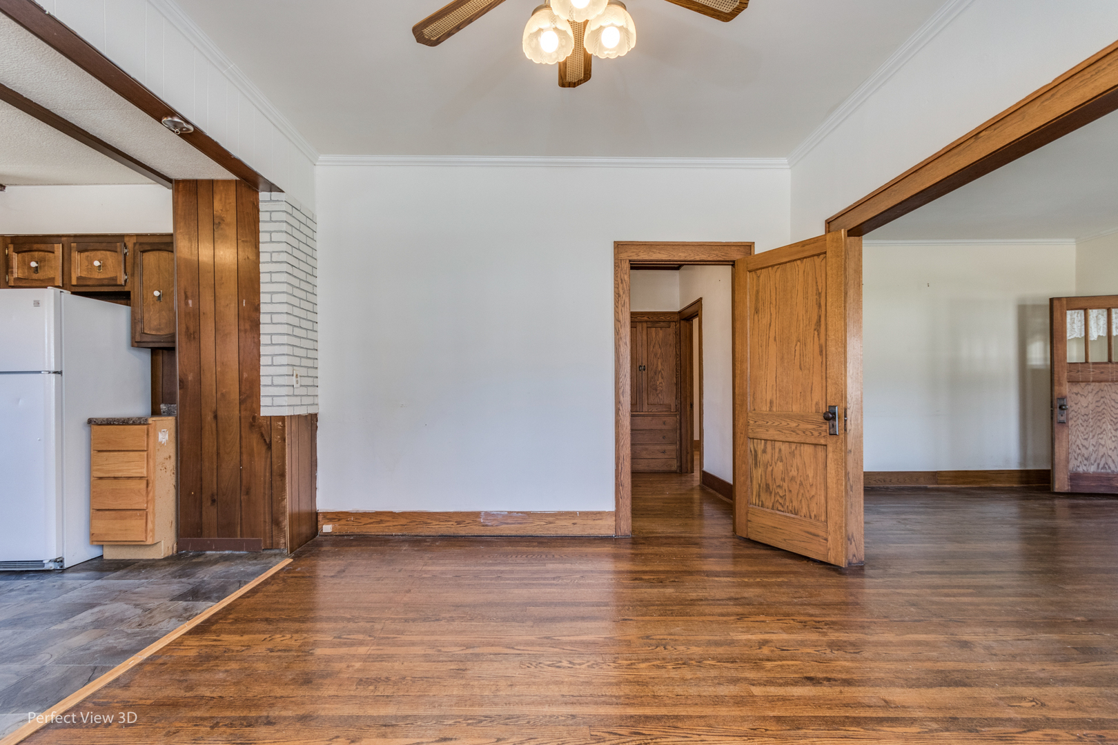 301 South Lincoln Street Ransom, IL 60470 - Photo 8 of 27 a view of an empty room with wooden floor and a window