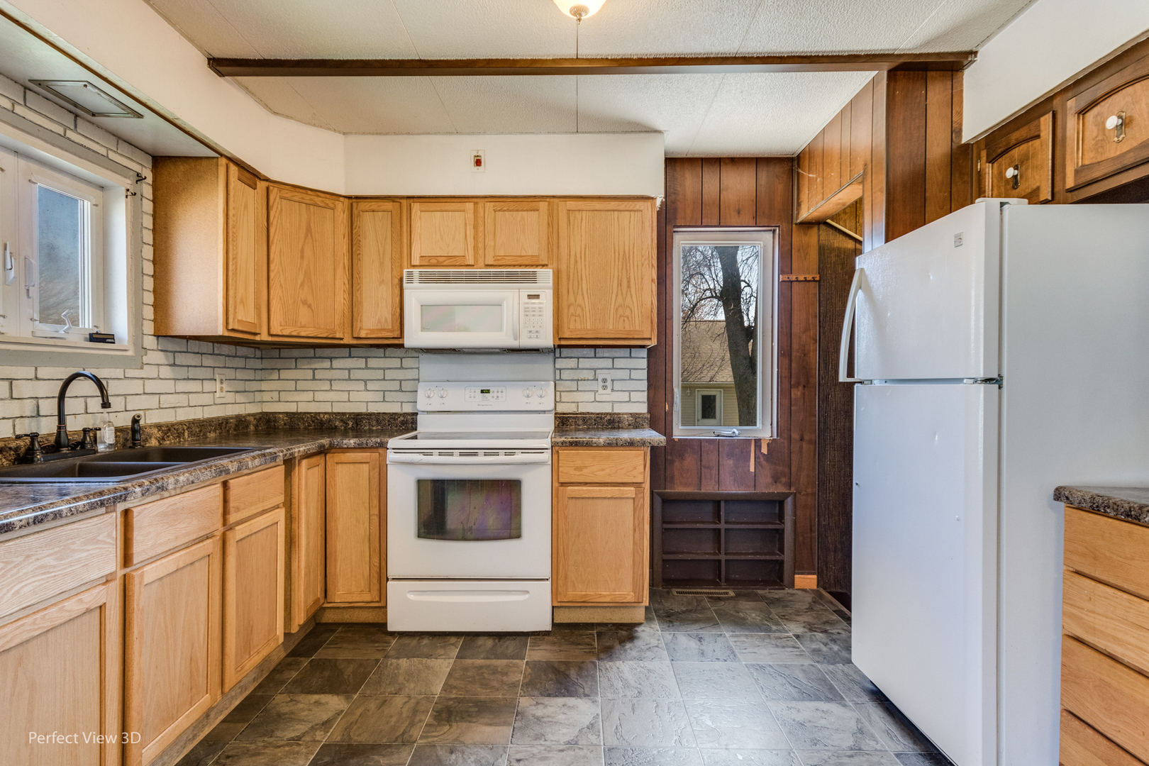 301 South Lincoln Street Ransom, IL 60470 - Photo 9 of 27 a kitchen with stainless steel appliances a refrigerator sink and cabinets