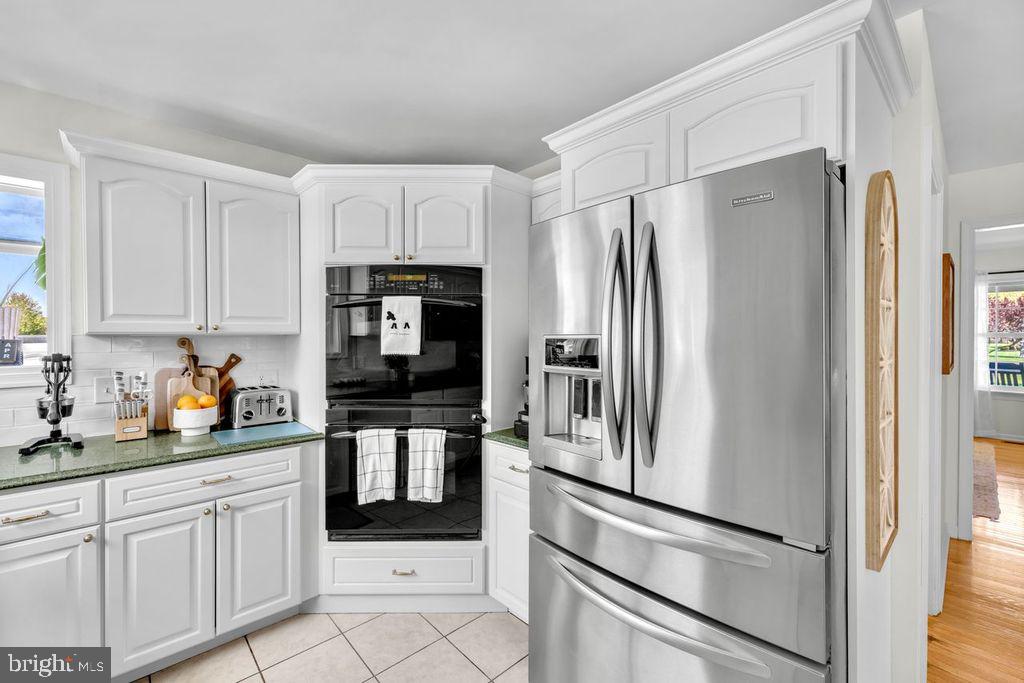 5616 Ryans Run Road East New Market, MD 21631 - Photo 21 of 57 Modern kitchen with sleek finishes.