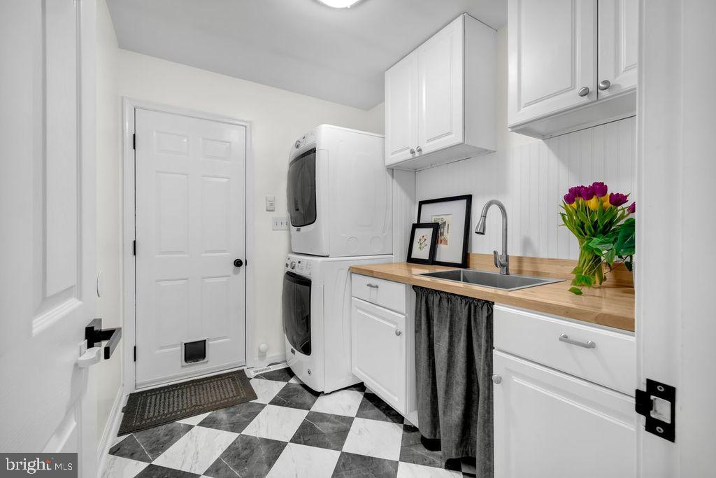5616 Ryans Run Road East New Market, MD 21631 - Photo 22 of 57 Charming laundry nook with modern flair.