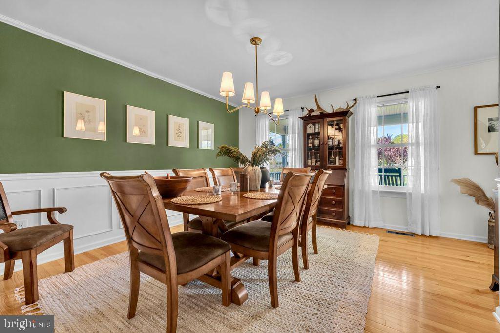5616 Ryans Run Road East New Market, MD 21631 - Photo 24 of 57 Charming dining space with green accents.