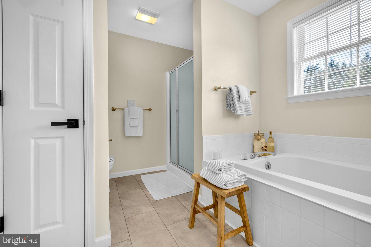 5616 Ryans Run Road East New Market, MD 21631 - Photo 30 of 57 Serene bathroom retreat with natural light.