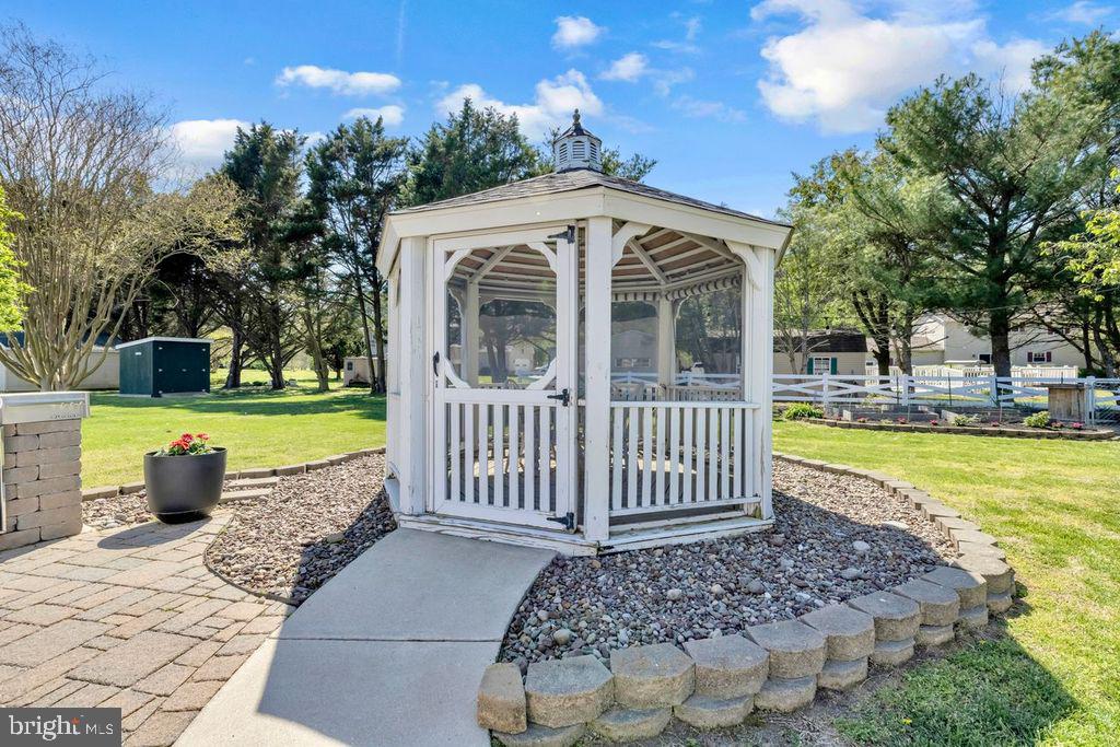 5616 Ryans Run Road East New Market, MD 21631 - Photo 44 of 57 Charming gazebo in a serene garden.