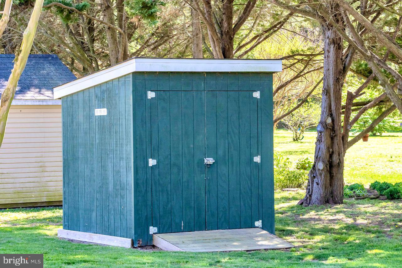 5616 Ryans Run Road East New Market, MD 21631 - Photo 48 of 57 Charming garden shed in serene setting.