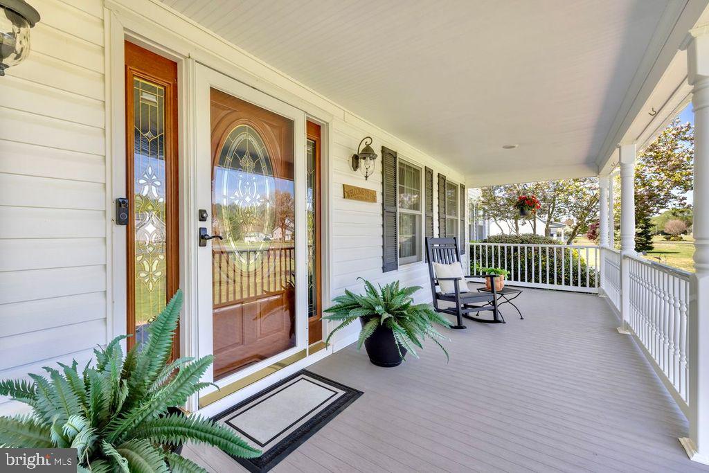 5616 Ryans Run Road East New Market, MD 21631 - Photo 51 of 56 a balcony with furniture and a potted plant