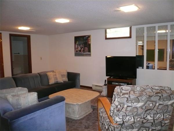 1164 Morgan Road West Springfield, MA 01089 - Photo 15 of 25 a living room with furniture and a flat screen tv