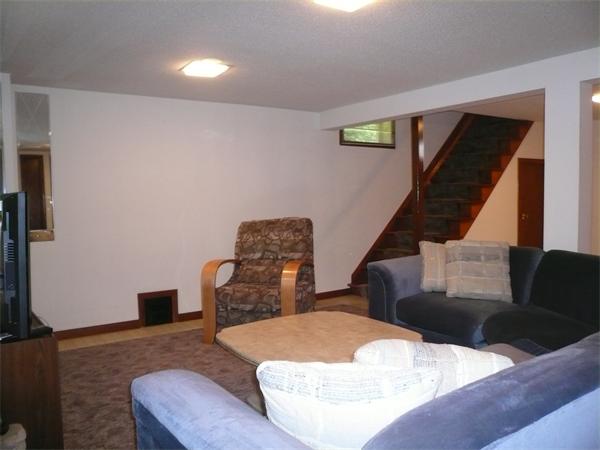 1164 Morgan Road West Springfield, MA 01089 - Photo 16 of 25 a living room with furniture and wooden floor