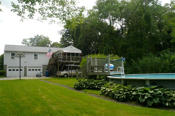 1164 Morgan Road West Springfield, MA 01089 - Photo 22 of 25 a front view of a house with garden