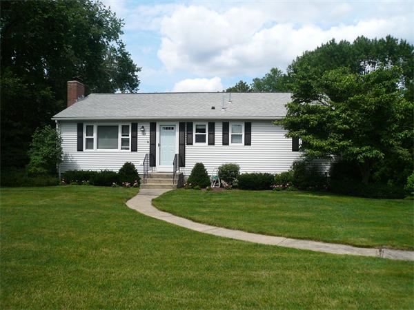 1164 Morgan Road West Springfield, MA 01089 - Photo 24 of 25 a front view of a house with a garden