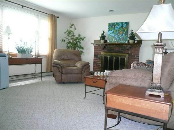 1164 Morgan Road West Springfield, MA 01089 - Photo 5 of 25 a living room with furniture and a fireplace