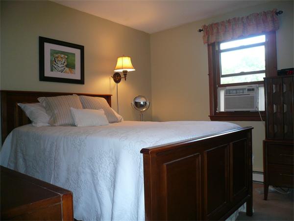 1164 Morgan Road West Springfield, MA 01089 - Photo 6 of 25 a bedroom with a bed and a window