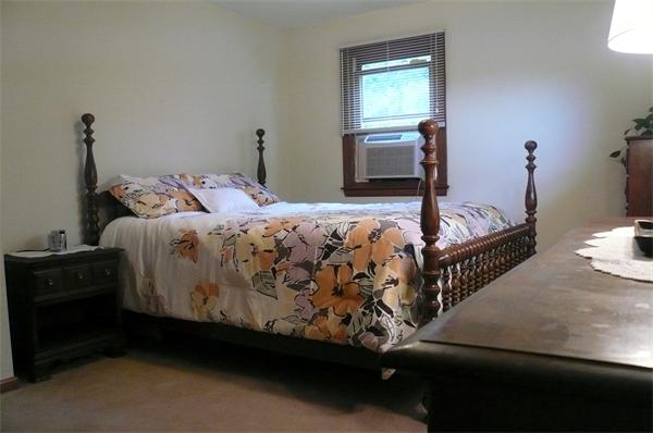 1164 Morgan Road West Springfield, MA 01089 - Photo 7 of 25 a bedroom with a bed and window