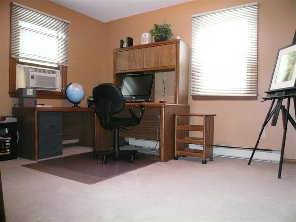 1164 Morgan Road West Springfield, MA 01089 - Photo 8 of 25 a view of a workspace with furniture and a window