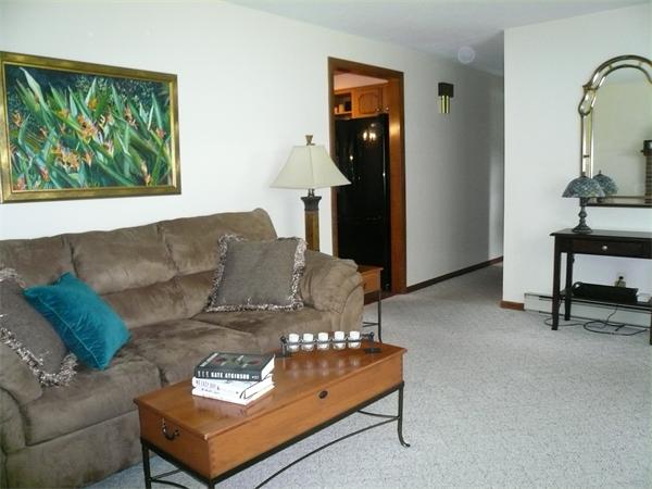 1164 Morgan Road West Springfield, MA 01089 - Photo 9 of 25 a living room with furniture and a potted plant