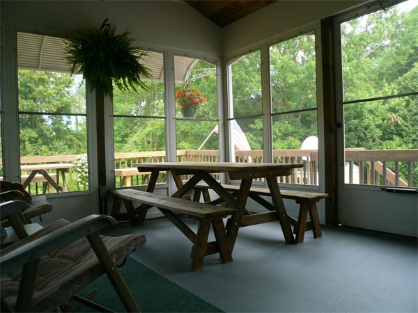 1164 Morgan Road West Springfield, MA 01089 - Photo 10 of 25 a view of a porch with furniture and a yard