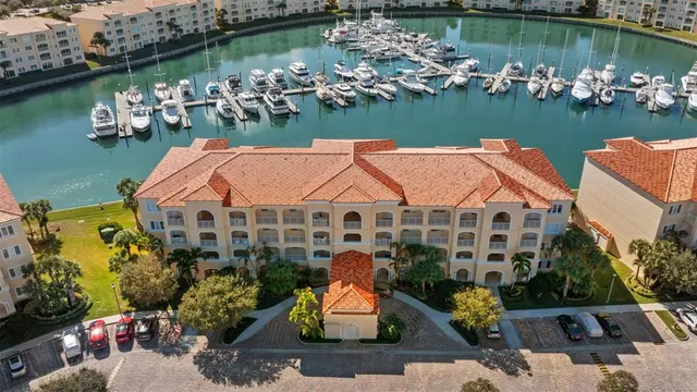 an aerial view of a house with a lake view