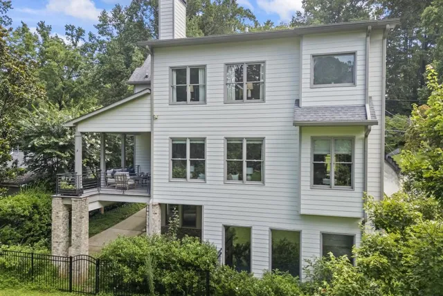 a view of a dining room that has a table and chairs