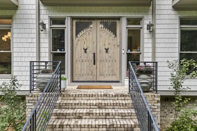 a open kitchen with sink cabinets and wooden floor