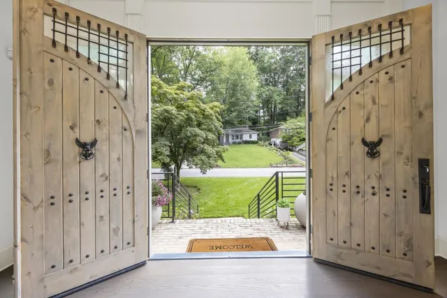 a kitchen with a table and chairs in it