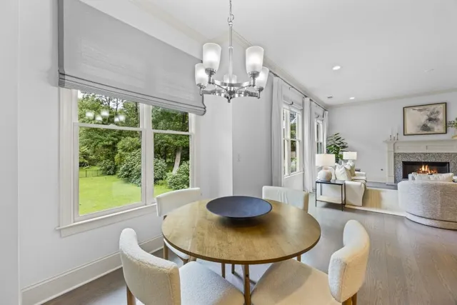 a large spacious bathroom with a double vanity sink a mirror and a bathtub