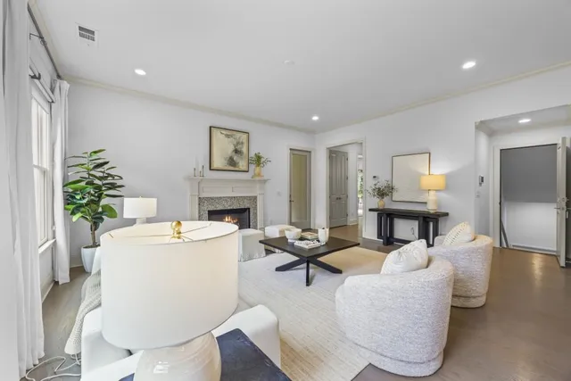 an empty room with furniture and a window