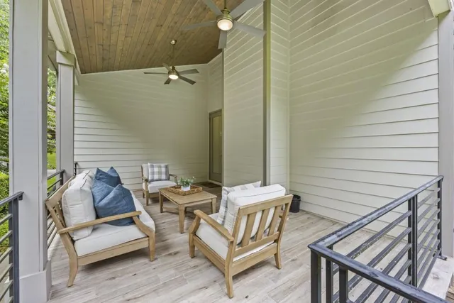 a sign broad in front of the red brick house