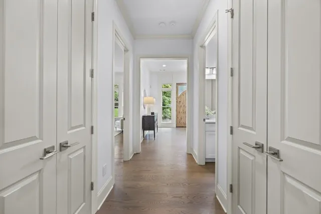 a sign broad in front of the red brick house