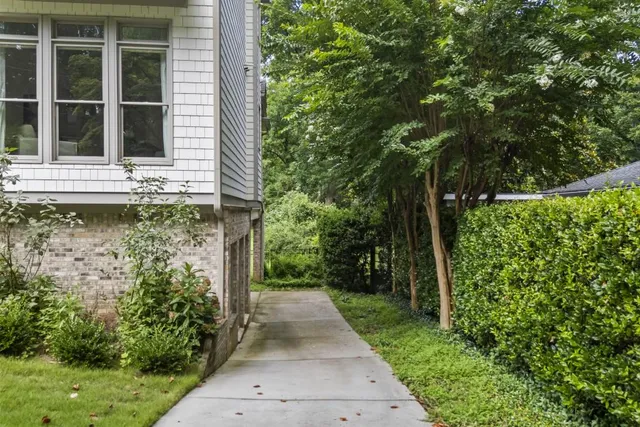 a view of outdoor space with deck and yard
