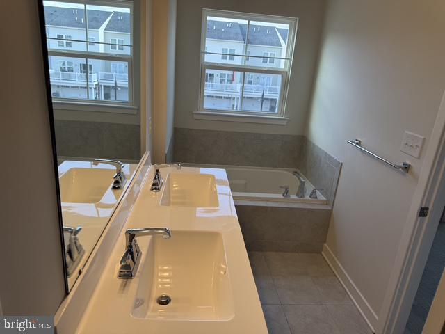 711 Quarry Point Road Malvern, PA 19355 - Photo 21 of 26 a bath tub sitting next to a window
